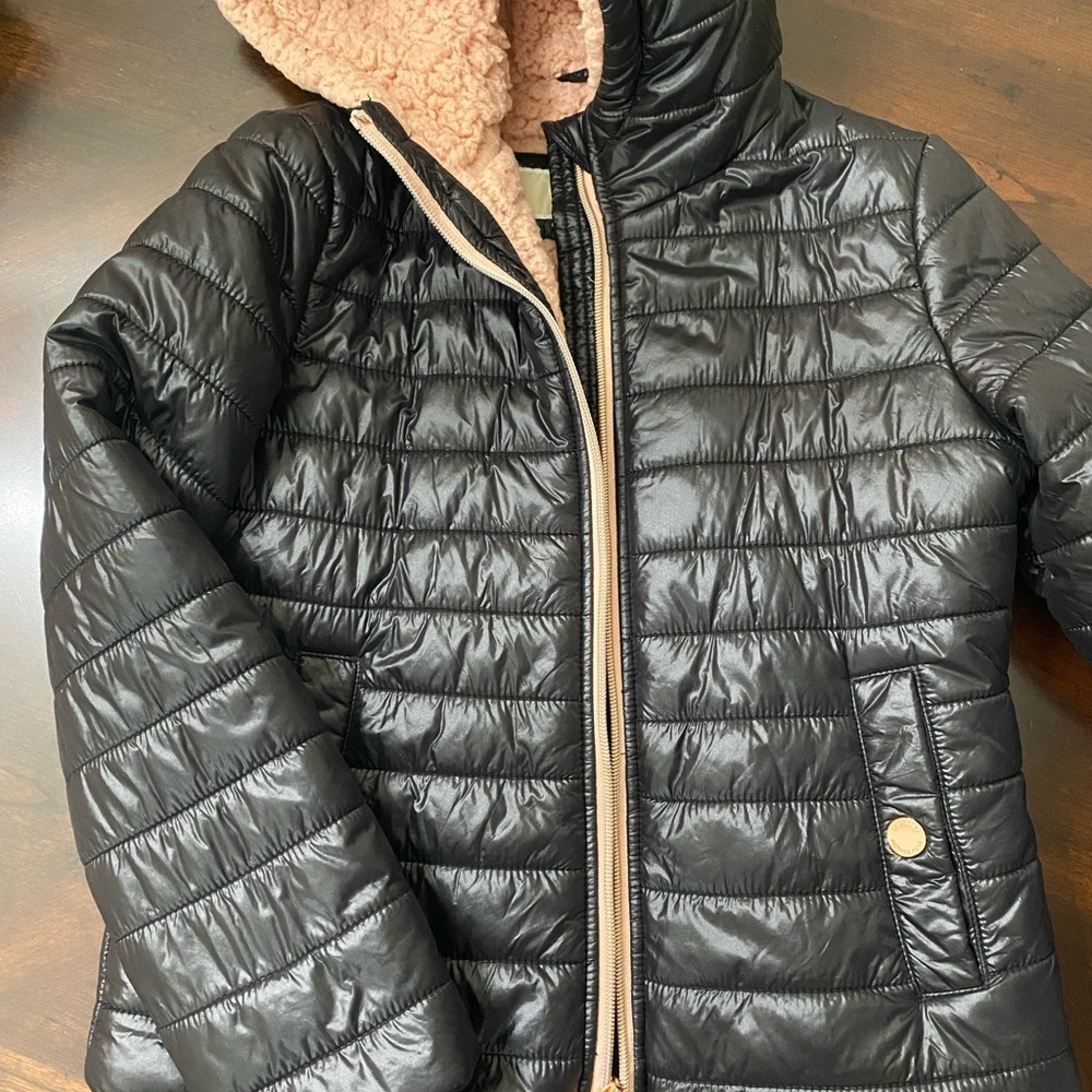 Girls Black Michael Kory coat with pink fleece lining. Size 7/8.